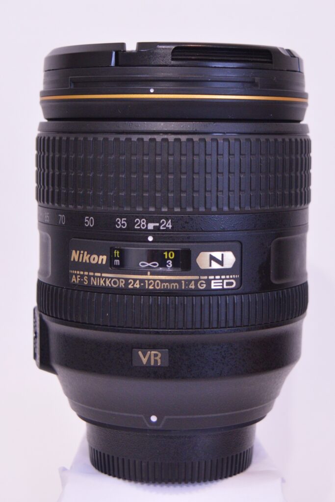used Nikon AF-S NIKKOR 24-120mm f/4G ED VR on white background
